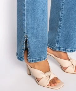 ELEVATED MID RISE STUD SLIT STRAIGHT JEANS -akira shop elevated mid rise stud slit straight jeans medium blue denim 7 7