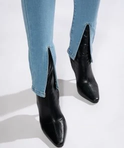 NIGHTFALL MID RISE SKINNY JEANS WITH FRONT SLIT -akira shop nightfall mid rise skinny jeans with front slit light blue denim 7 7 c1